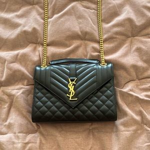 Yves St Laurent shoulder and cross body bag.